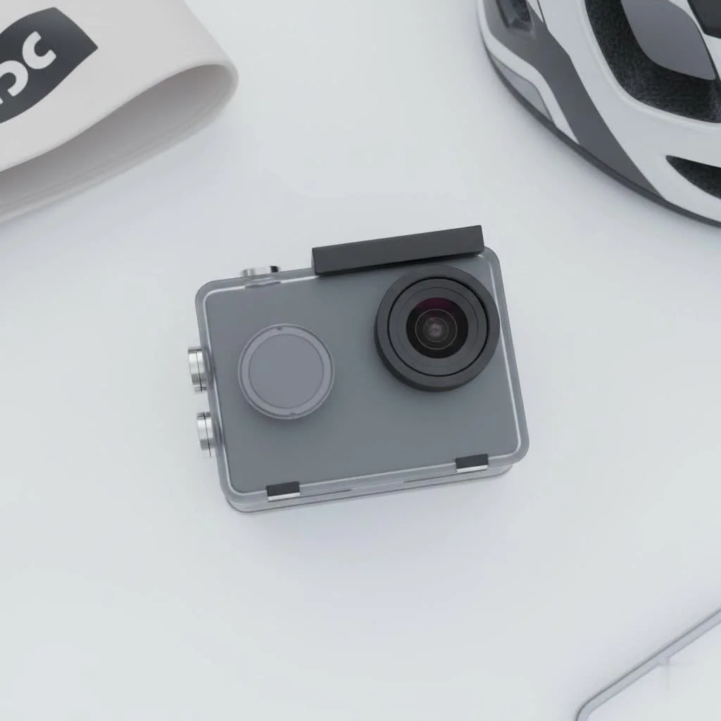 Person filming with an action camera while mountain biking